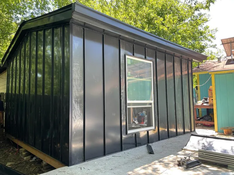 Black standing seam metal wall panels for Roof Inspection in Mukwonago