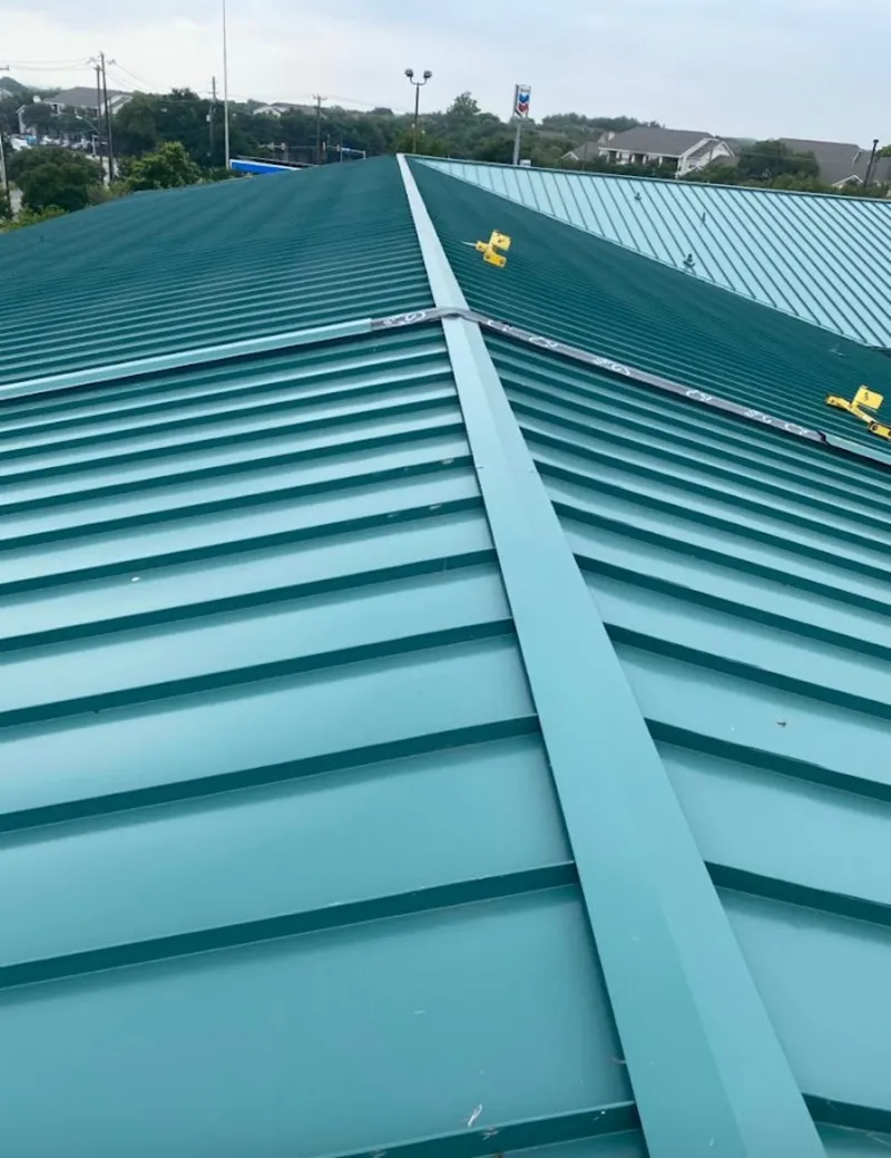 Green commercial metal roof ridge and valley for Metal Roof Repair in Mukwonago